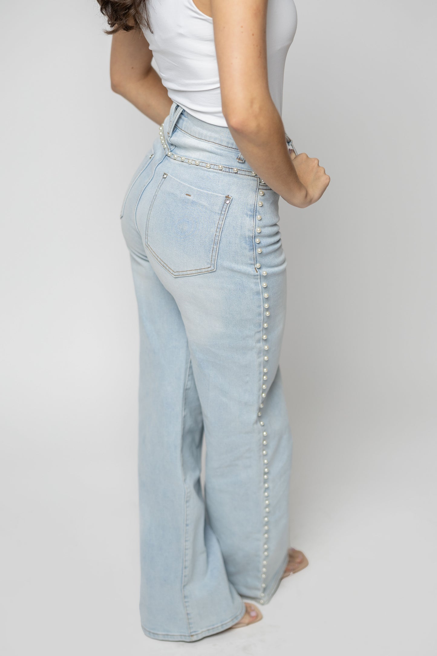 Denim pants with pearls