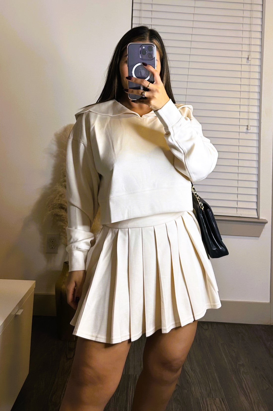 Sweatershirt and pleated mini skirt set