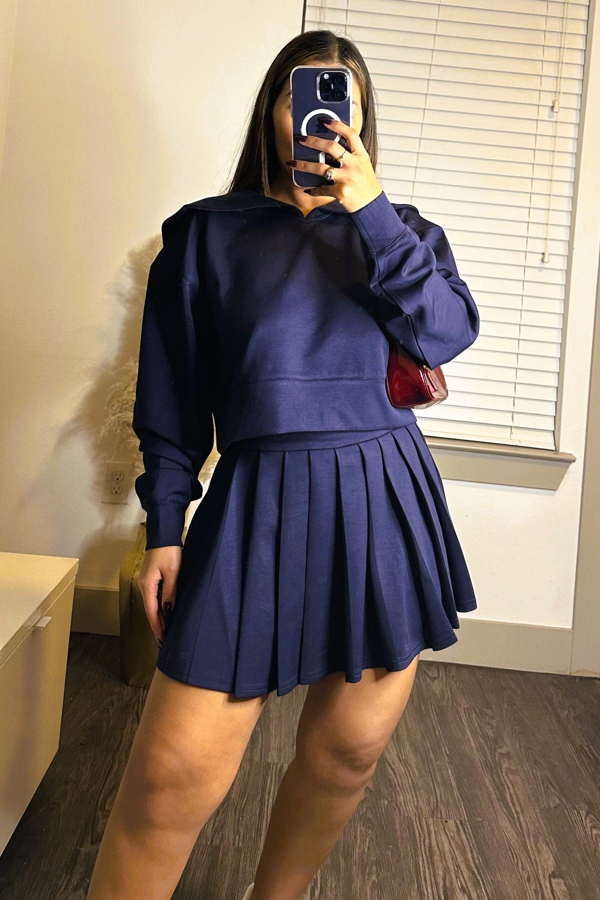 Sweatershirt and pleated mini skirt set